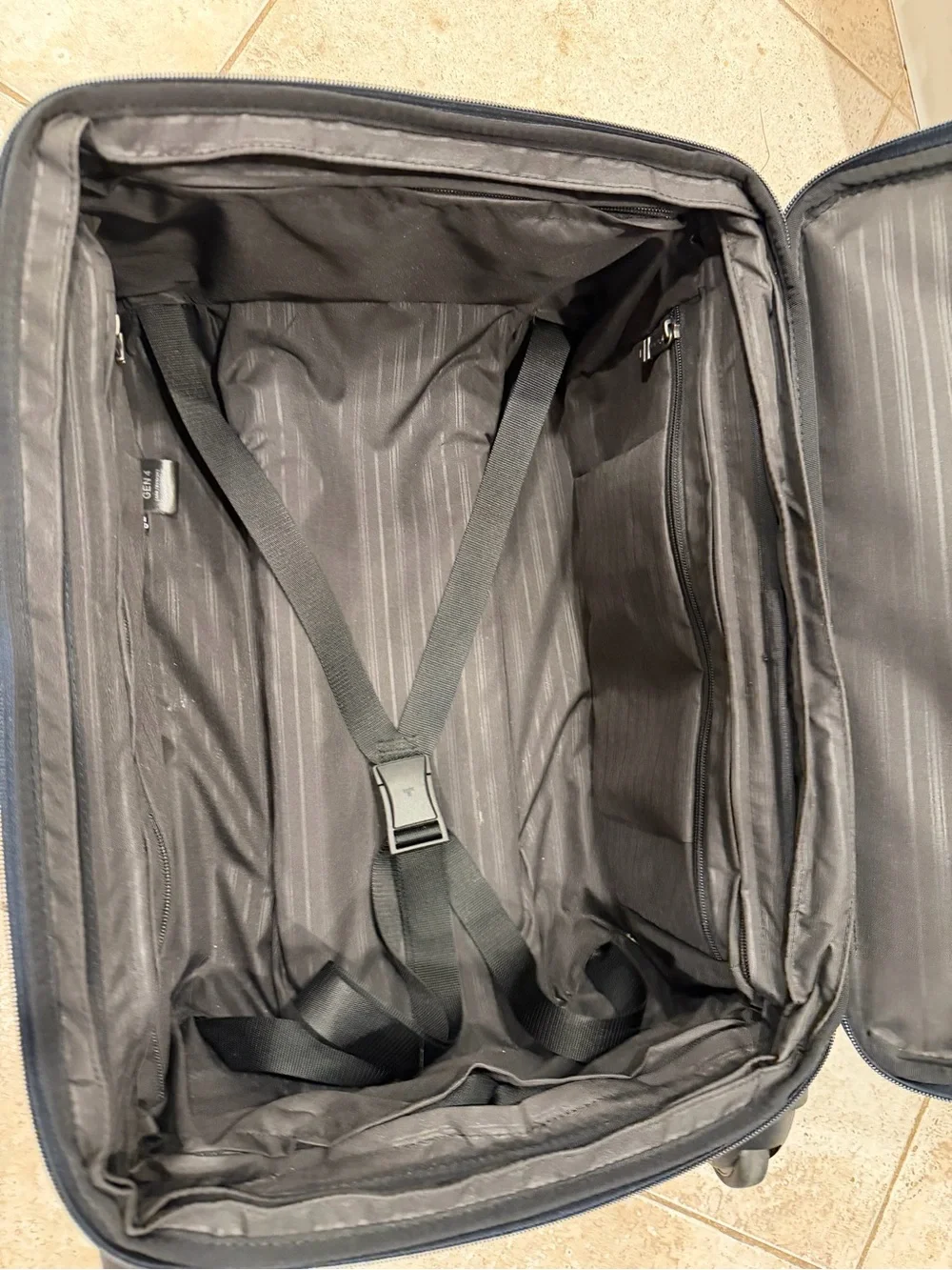 Tumi Navy Softside Carry-On Spinner
